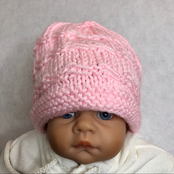 pink knitted baby hat